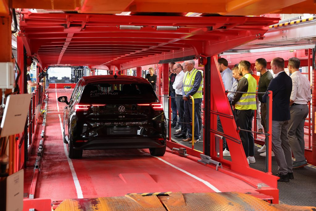 Car driving autonomously onto a train wagon at Audi plant in Ingolstadt.